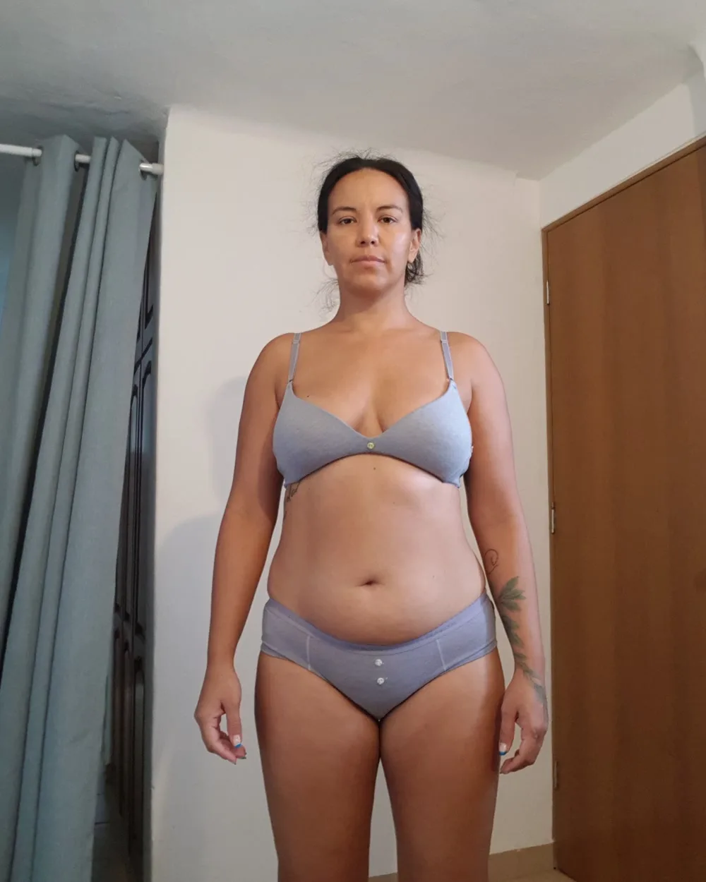Gal Dorado standing front-on in August 2023, before she began strength training